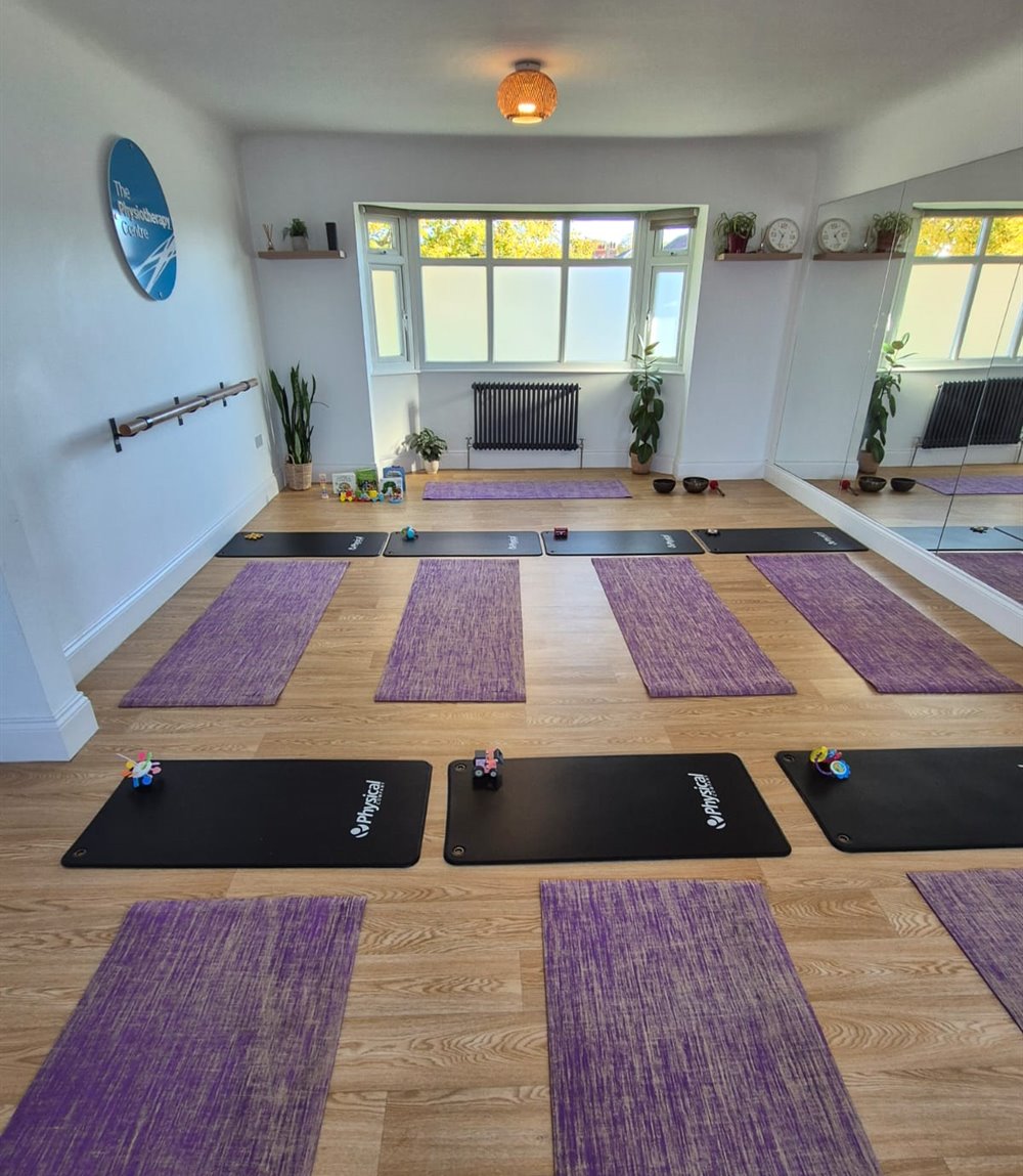 Yoga mats laid out for a mum and baby yoga class at The Physiotherapy Centre in Mossley Hill, Liverpool